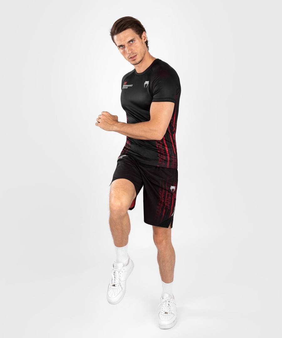 ufc venum performance institute 2.0 herre kortærmet rashguard - sortrød